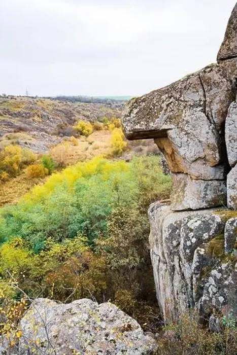 Framed Print : Aktovsky Canyon, Ukraine. Autumn trees and large stone boulders around Framed Print : Aktovsky Canyon, Ukraine. Autumn trees and large stone boulders around