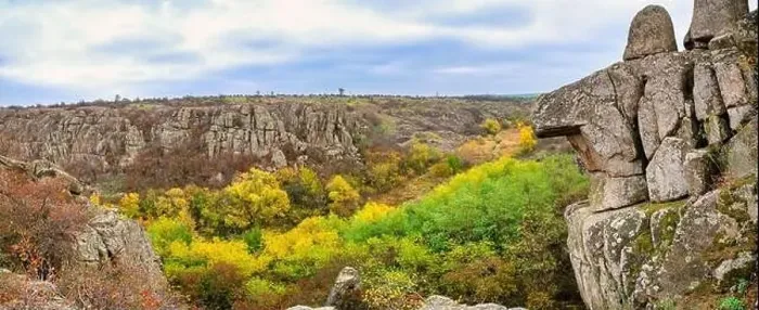 Framed Print : Aktovsky Canyon, Ukraine. Autumn trees and large stone boulders around Framed Print : Aktovsky Canyon, Ukraine. Autumn trees and large stone boulders around