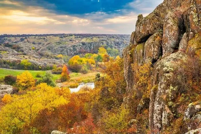 Framed Print : Aktovsky Canyon, Ukraine. Autumn trees and large stone boulders around Framed Print : Aktovsky Canyon, Ukraine. Autumn trees and large stone boulders around