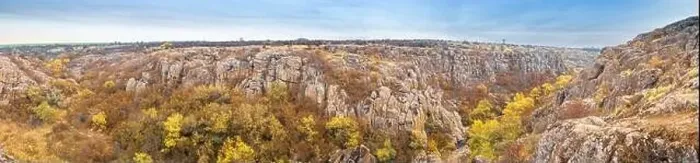 Framed Print : Aktovsky Canyon, Ukraine. Autumn trees and large stone boulders around Framed Print : Aktovsky Canyon, Ukraine. Autumn trees and large stone boulders around