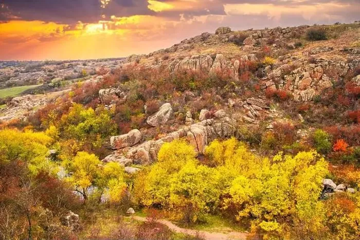 Framed Print : Aktovsky Canyon, Ukraine. Autumn trees and large stone boulders around Framed Print : Aktovsky Canyon, Ukraine. Autumn trees and large stone boulders around