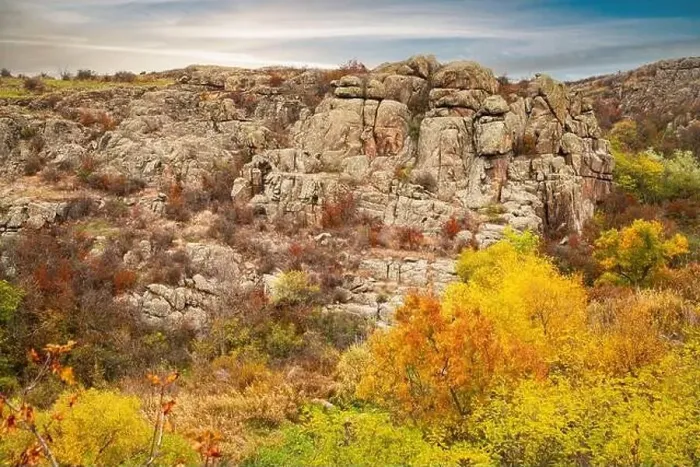 Framed Print : Aktovsky Canyon, Ukraine. Autumn trees and large stone boulders around Framed Print : Aktovsky Canyon, Ukraine. Autumn trees and large stone boulders around