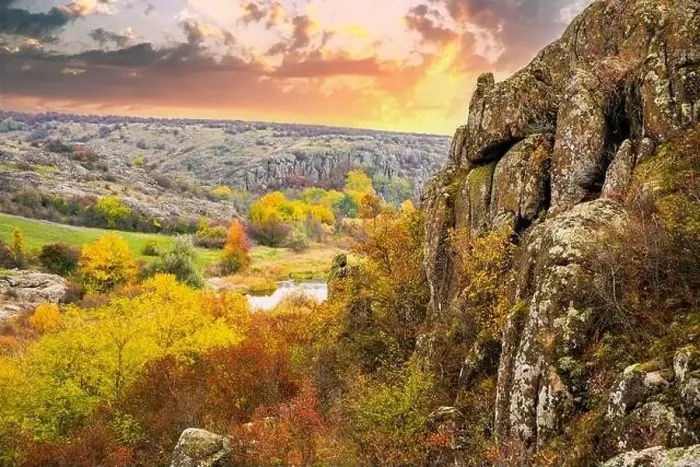 Framed Print : Aktovsky Canyon, Ukraine. Autumn trees and large stone boulders around Framed Print : Aktovsky Canyon, Ukraine. Autumn trees and large stone boulders around