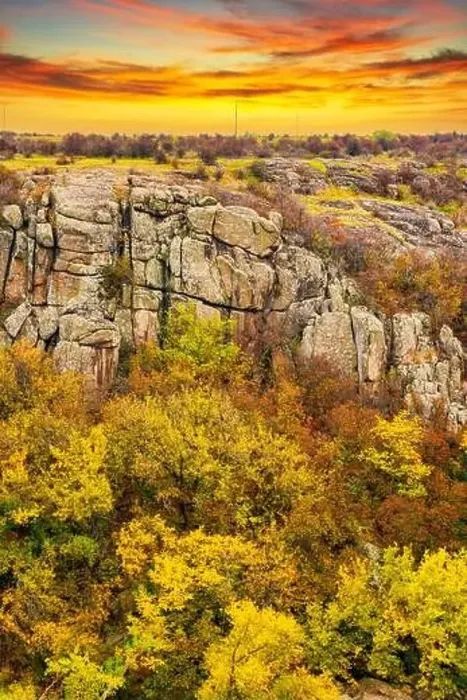 Framed Print : Aktovsky Canyon, Ukraine. Autumn trees and large stone boulders around Framed Print : Aktovsky Canyon, Ukraine. Autumn trees and large stone boulders around