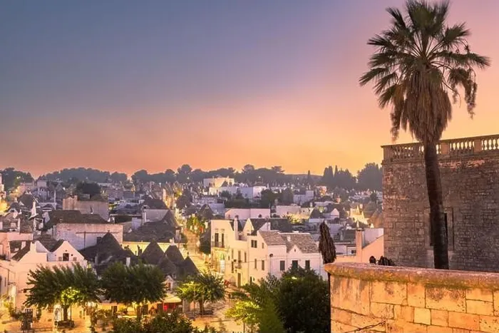 Framed Print : Alberobello, Italy with Trulli houses at dusk Framed Print : Alberobello, Italy with Trulli houses at dusk
