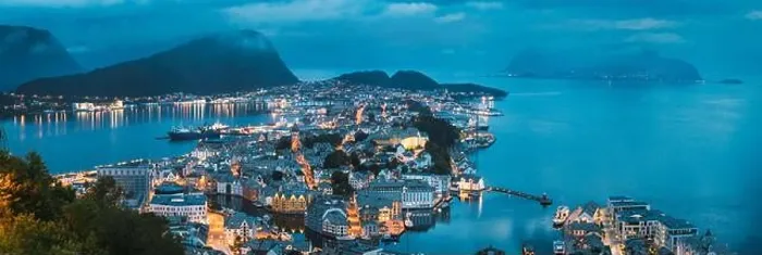 Framed Print : Alesund, Norway - June 21, 2019: Night View Of Alesund Skyline Cityscape. Historical Center In Summer Evening. Famous Norwegian Landmark And Popular D