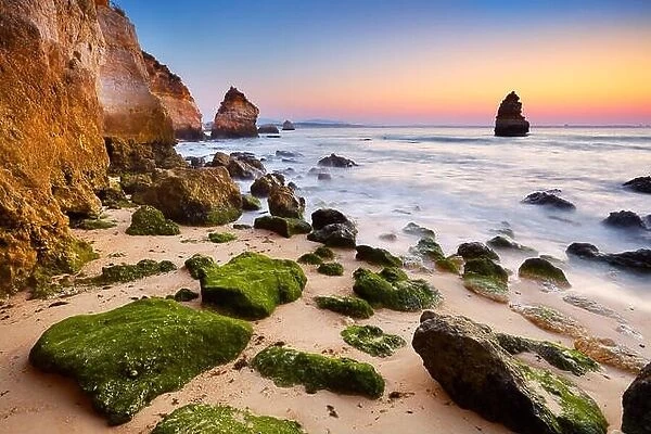 Algarve coast at sunrise near Lagos, Algarve, Portugal