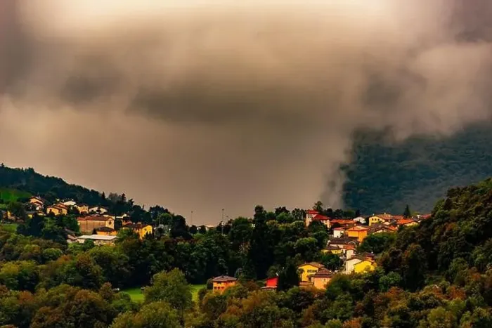 Framed Print : Alpine Village Novaggio in the Clouds with Mountain View in Ticino, Switzerland Framed Print : Alpine Village Novaggio in the Clouds with Mountain View in Ticino, Switzerland