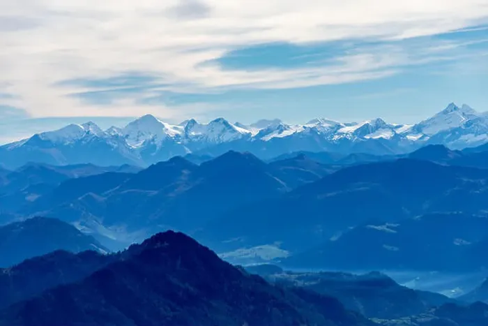 Framed Print : alps mountain range in blue appearance due to aerial perspective, covered with snow Framed Print : alps mountain range in blue appearance due to aerial perspective, covered with snow