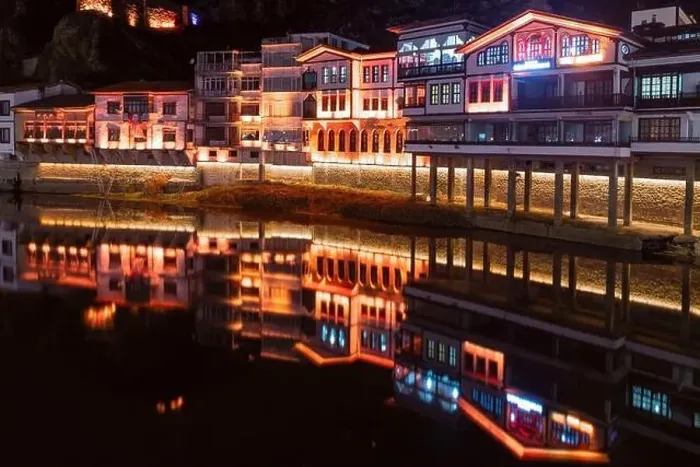 Framed Print : Amasya, Turkey - December 22, 2022 : Old Ottoman houses and clock tower view by the Yesilirmak River in Amasya City Framed Print : Amasya, Turkey - December 22, 2022 : Old Ottoman houses and clock tower view by the Yesilirmak River in Amasya City