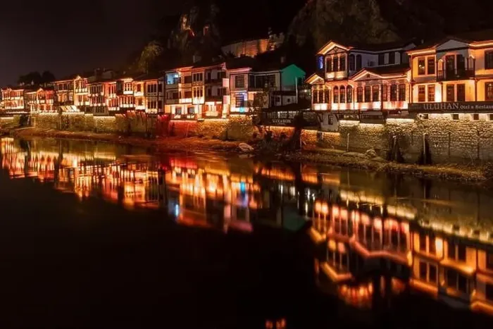 Framed Print : Amasya, Turkey - December 22, 2022 : Old Ottoman houses and clock tower view by the Yesilirmak River in Amasya City Framed Print : Amasya, Turkey - December 22, 2022 : Old Ottoman houses and clock tower view by the Yesilirmak River in Amasya City