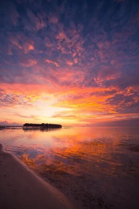 Framed Print : Amazing abstract background. Beautiful sunset colors in Maldives. Long jetty and luxury overwater villas Framed Print : Amazing abstract background. Beautiful sunset colors in Maldives. Long jetty and luxury overwater villas