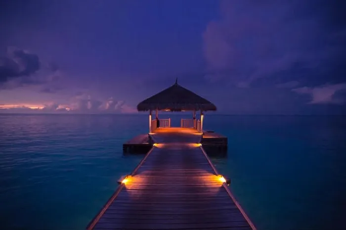 Framed Print : Amazing abstract background. Beautiful sunset colors in Maldives. Long jetty and luxury overwater villas Framed Print : Amazing abstract background. Beautiful sunset colors in Maldives. Long jetty and luxury overwater villas