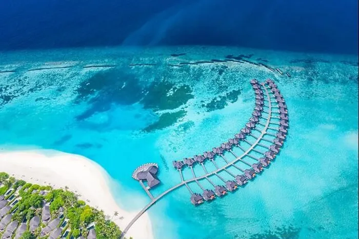 Framed Print : Amazing aerial landscape, Maldives island, luxury water villas resort and wooden pier. Beautiful sky and clouds and beach, summer vacation holiday Framed Print : Amazing aerial landscape, Maldives island, luxury water villas resort and wooden pier. Beautiful sky and clouds and beach, summer vacation holiday
