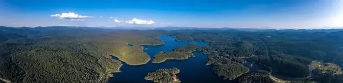 Framed Print : Amazing aerial panorama of blue water and green forest Framed Print : Amazing aerial panorama of blue water and green forest