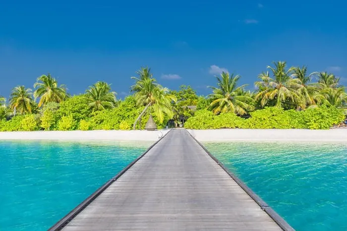 Framed Print : Amazing beach landscape, long jetty into the palm trees. Maldives, paradise beach background, design banner. Luxury vacation and holiday concept Framed Print : Amazing beach landscape, long jetty into the palm trees. Maldives, paradise beach background, design banner. Luxury vacation and holiday concept