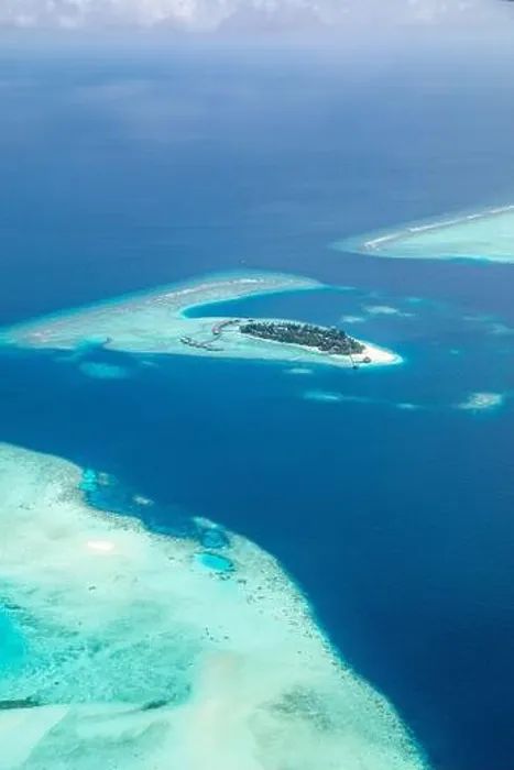 Framed Print : Amazing bird eyes view in Maldives from plane or drone. Luxury resort hotel water villas bungalows. Summer vacation holiday landscape destination Framed Print : Amazing bird eyes view in Maldives from plane or drone. Luxury resort hotel water villas bungalows. Summer vacation holiday landscape destination