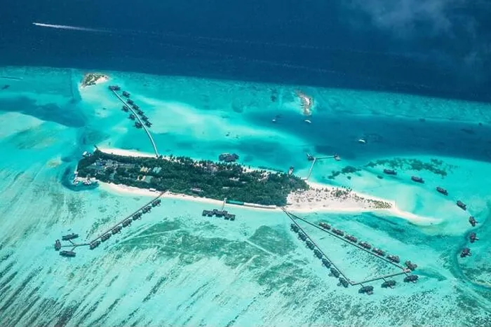 Framed Print : Amazing bird eyes view in Maldives from plane or drone. Luxury resort hotel water villas bungalows. Summer vacation holiday landscape destination Framed Print : Amazing bird eyes view in Maldives from plane or drone. Luxury resort hotel water villas bungalows. Summer vacation holiday landscape destination