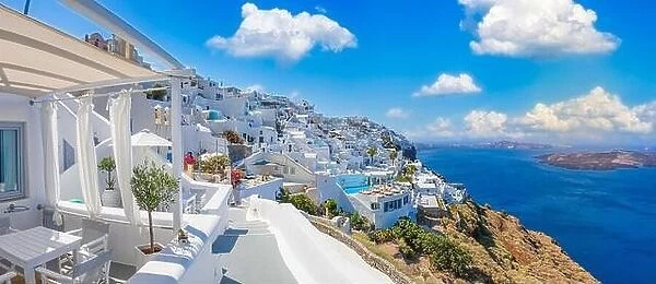 Amazing cityscape view of Santorini island, Oia village. Picturesque famous Greek resort Greece, Europe. Traveling concept background. Summer vacation