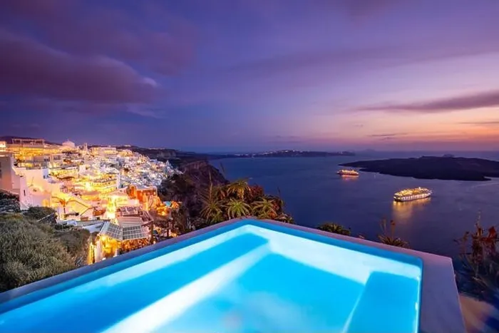 Framed Print : Amazing evening landscape of Fira, infinity pool caldera view Santorini, Greece with cruise ships sunset. Cloudy dramatic sky sunset, wonderful summer Framed Print : Amazing evening landscape of Fira, infinity pool caldera view Santorini, Greece with cruise ships sunset. Cloudy dramatic sky sunset, wonderful summer