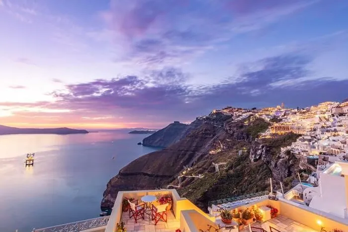 Framed Print : Amazing evening view of Santorini island. Romantic sunset sunrise summer travel destination. Gorgeous sunset sky, white architecture, led lights Framed Print : Amazing evening view of Santorini island. Romantic sunset sunrise summer travel destination. Gorgeous sunset sky, white architecture, led lights