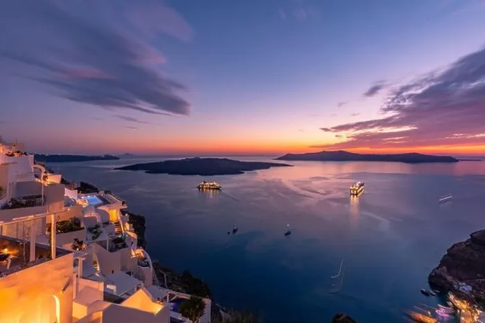 Framed Print : Amazing evening view of Santorini island. Romantic sunset sunrise summer travel destination. Gorgeous sunset sky, white architecture, led lights Framed Print : Amazing evening view of Santorini island. Romantic sunset sunrise summer travel destination. Gorgeous sunset sky, white architecture, led lights