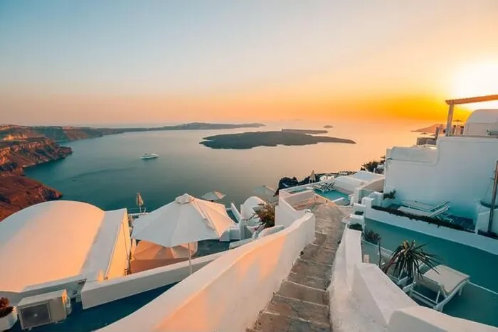 Framed Print : Amazing evening view over white architecture and romantic sunset light, Santorini, summer romance, honeymoon destination. Traveling concept, vacation Framed Print : Amazing evening view over white architecture and romantic sunset light, Santorini, summer romance, honeymoon destination. Traveling concept, vacation