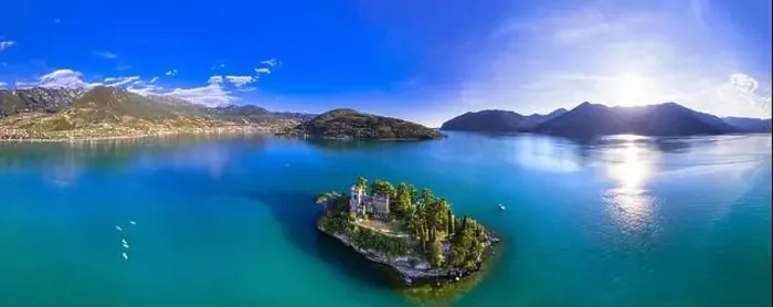 Framed Print : Amazing lake Iseo scenery with picturesque small island Loreto with castle, aerial drone view. Italy, Brescia province Framed Print : Amazing lake Iseo scenery with picturesque small island Loreto with castle, aerial drone view. Italy, Brescia province