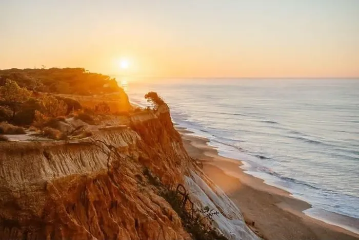 Framed Print : Amazing landscape of Falesia beach with orange cliffs at sunrise, Algarve, Portugal
