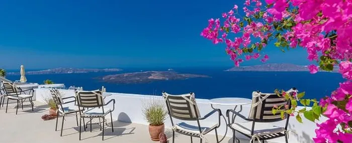 Framed Print : Amazing panoramic landscape, luxury travel vacation. Oia town on Santorini island, Greece. Traditional and famous white architecture and pink flowers Framed Print : Amazing panoramic landscape, luxury travel vacation. Oia town on Santorini island, Greece. Traditional and famous white architecture and pink flowers