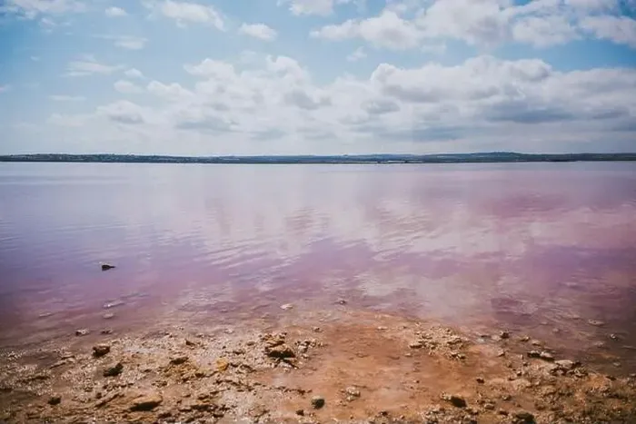 Framed Print : From above of amazing pink salt lake and of shore under cloudless blue sky in sunny summer day Framed Print : From above of amazing pink salt lake and of shore under cloudless blue sky in sunny summer day