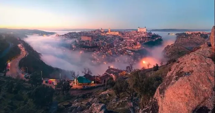 Framed Print : From above amazing scenery of illuminated ancient Alcazar de Toledo castle over town in misty twilight Framed Print : From above amazing scenery of illuminated ancient Alcazar de Toledo castle over town in misty twilight