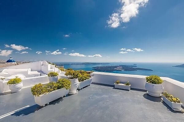 Amazing scenery, terrace with sea view. White architecture on Santorini island, Greece. Luxury travel destinations concept, amazing summer vacation