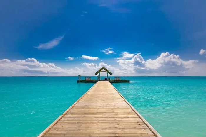 Framed Print : Amazing seascape panorama at Maldives. Luxury resort villas seascape under sunny blue sky. Water bungalow and jetty, ocean lagoon Framed Print : Amazing seascape panorama at Maldives. Luxury resort villas seascape under sunny blue sky. Water bungalow and jetty, ocean lagoon