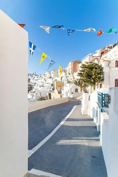 Framed Print : Amazing street view Santorini island. Greece traditional white and blue architecture, sea view and fantastic summer mood vibes. Luxury travel holiday
