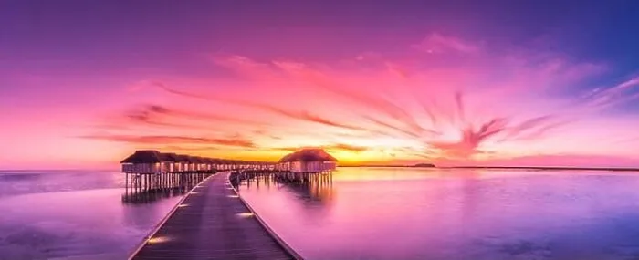Framed Print : Amazing sunset panorama at Maldives. Luxury resort villas seascape with soft led lights under colorful sky. Beautiful twilight sky and colorful clouds Framed Print : Amazing sunset panorama at Maldives. Luxury resort villas seascape with soft led lights under colorful sky. Beautiful twilight sky and colorful clouds
