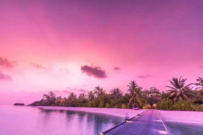 Framed Print : Amazing sunset sky and reflection on calm sea, Maldives beach landscape of luxury over water pier. Exotic scenery of summer vacation and holiday Framed Print : Amazing sunset sky and reflection on calm sea, Maldives beach landscape of luxury over water pier. Exotic scenery of summer vacation and holiday