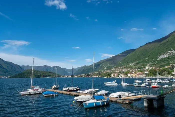 Framed Print : Amazing view of port with boats in Tremezzo - Como lake in Italy Framed Print : Amazing view of port with boats in Tremezzo - Como lake in Italy