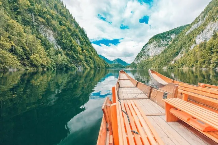 Framed Print : Amazing wooden boats on lake with reflection of mountain and sky. Freedom and adventure concept. Beautiful nature concept, mountain nature Framed Print : Amazing wooden boats on lake with reflection of mountain and sky. Freedom and adventure concept. Beautiful nature concept, mountain nature