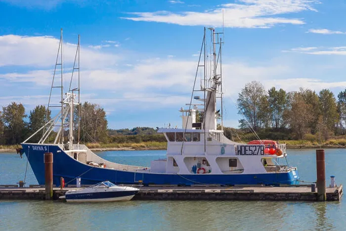 Framed Print : American fishing vessel Daynas tied up at a dock in Steveston British Columbia Canada Framed Print : American fishing vessel Daynas tied up at a dock in Steveston British Columbia Canada