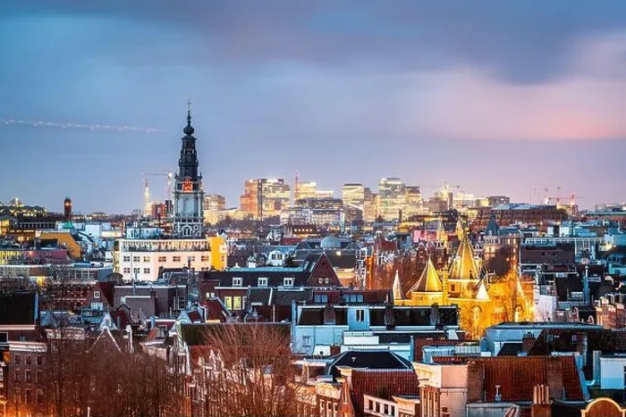 Framed Print : Amsterdam, Netherlands historic cityscape with the modern Zuidas district in the distance at dusk Framed Print : Amsterdam, Netherlands historic cityscape with the modern Zuidas district in the distance at dusk