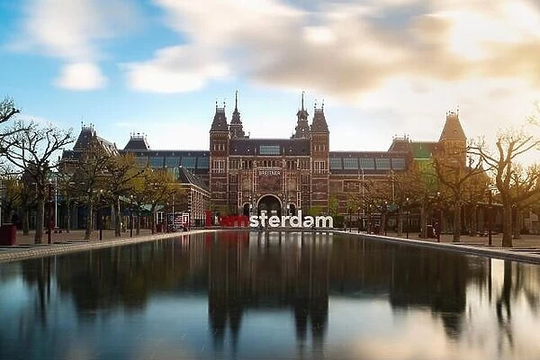 Amsterdam, Netherlands - May 3, 2016: Beautiful tulips in front of the Rijksmuseum (National state museum), a popular touristic destination in Amsterd