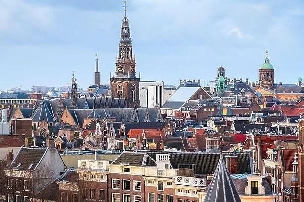 Amsterdam, Netherlands old town cityscape with cathedral towers at udskl