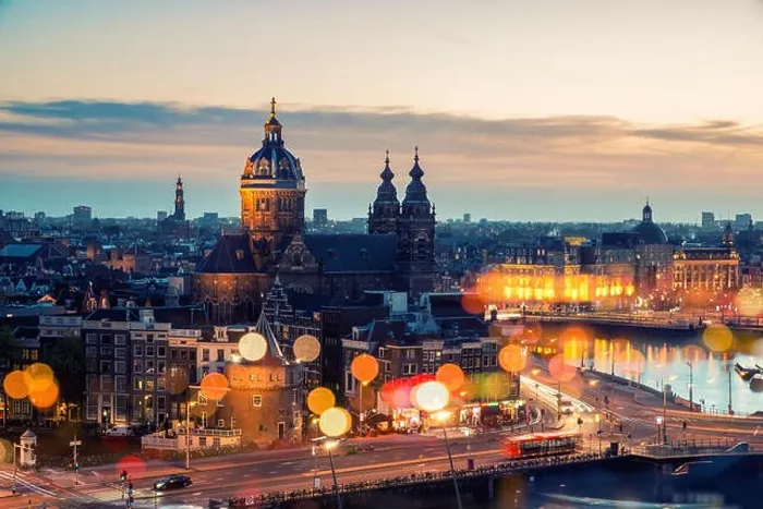 Framed Print : Amsterdam skyline in historical area at night, Netherlands. Ariel view of Amsterdam, Netherlands Framed Print : Amsterdam skyline in historical area at night, Netherlands. Ariel view of Amsterdam, Netherlands