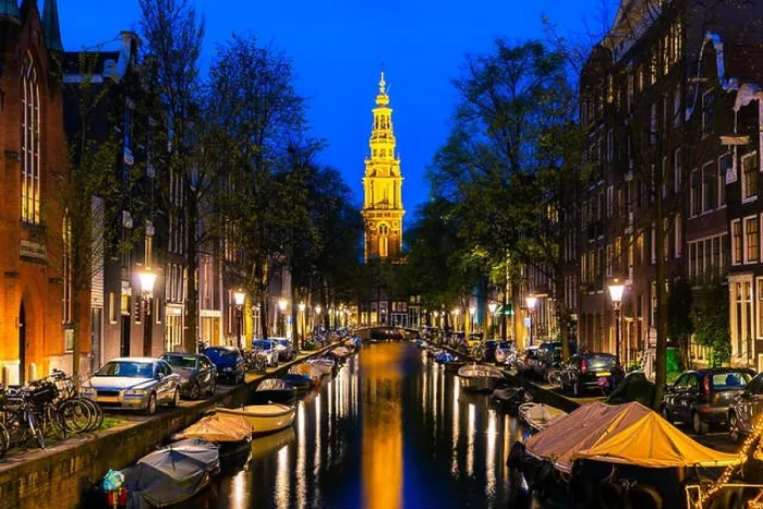 Framed Print : Amsterdam Zuiderkerk church tower at the end of a canal in the city of Amsterdam, Netherlands at night Framed Print : Amsterdam Zuiderkerk church tower at the end of a canal in the city of Amsterdam, Netherlands at night