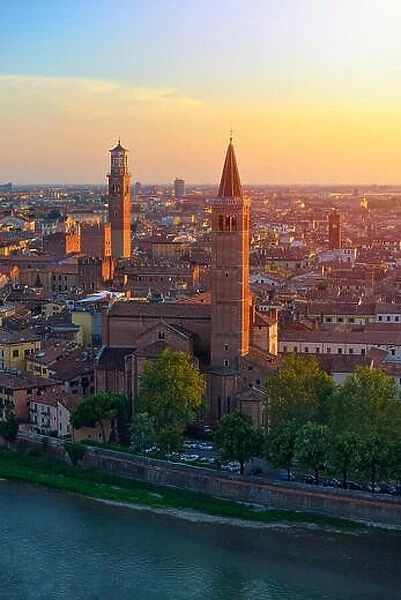 Top angle view of Verona, Italy at summer sunset, sun lens flare