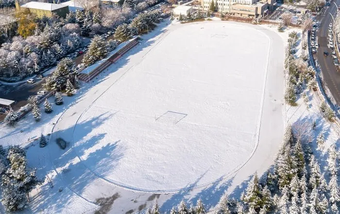 Framed Print : Ankara / Turkey-December 13 2018 - Aerial view of football field with green grass covered with snow in winter. Top view Framed Print : Ankara / Turkey-December 13 2018 - Aerial view of football field with green grass covered with snow in winter. Top view