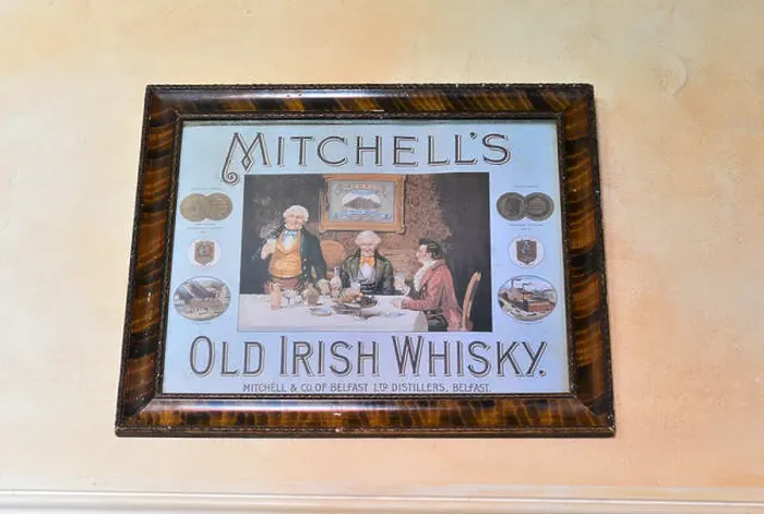 Framed Print : Antique metal sign advertising Mitchell's Old Irish whiskey at the Ulster American Folk Park Framed Print : Antique metal sign advertising Mitchell's Old Irish whiskey at the Ulster American Folk Park