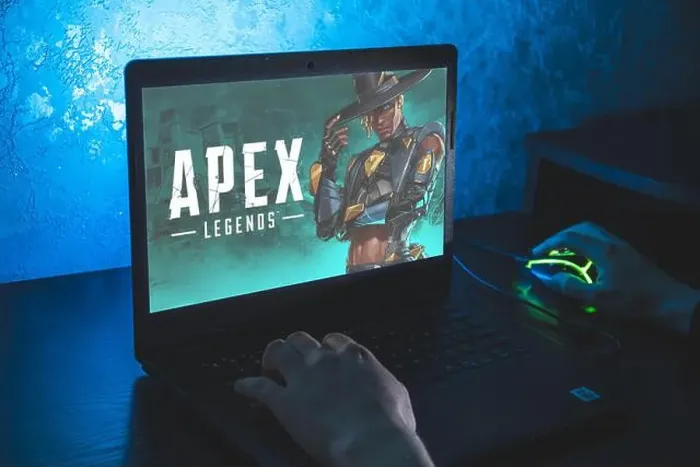Framed Print : Apex Legends is a free-to-play battle royale-hero shooter game. Video computer game. Man play video game on laptop Framed Print : Apex Legends is a free-to-play battle royale-hero shooter game. Video computer game. Man play video game on laptop