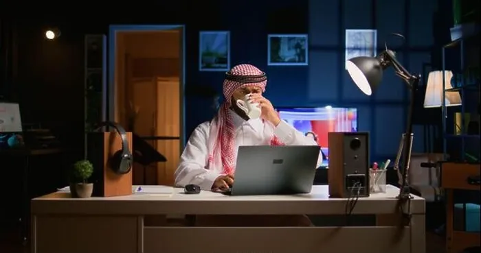 Framed Print : Arabic job candidate remotely being interviewed by HR worker while at home. Middle Eastern man getting his credentials checked during online video Framed Print : Arabic job candidate remotely being interviewed by HR worker while at home. Middle Eastern man getting his credentials checked during online video